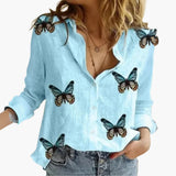 Langarm Damen-Bluse - Vintage Stil mit großen Punkten – Hellblau mit schwarzen Punkten und Schmetterlingen