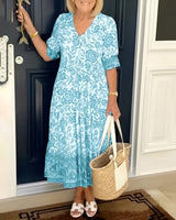 Evelyne | Elegantes Kleid mit Blumen – Hellblau