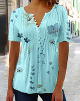 Kurzärmlige Bluse mit V-Ausschnitt und Knopfdruck – Blau