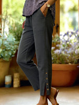 Bellamy - Knöchellange Hose mit Knopfdetail – Schwarz