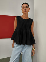Ärmellose Plissee-Peplum-Bluse – Eleganter Taillenbetonter Look – Schwarz