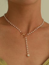 Elegante Halskette mit Perlen und Schleifen – Gold