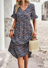 Veloura – Vintage-Kleid mit V-Ausschnitt und Blumenmuster – Blau