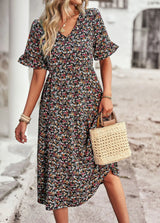 Veloura – Vintage-Kleid mit V-Ausschnitt und Blumenmuster – Schwarz