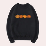 Afra – halloween-pullover mit rundhalsausschnitt und kürbismotiv für damen – Schwarz