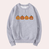 Afra – halloween-pullover mit rundhalsausschnitt und kürbismotiv für damen – Grau