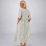 Zunia – Midi-Kleid Mit Blumenmuster Und Taschen – Hellgelb