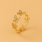 Eleganter Schmetterlingsring aus Kupfer mit funkelnden Zirkonias – Gold