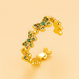 Eleganter Schmetterlingsring aus Kupfer mit funkelnden Zirkonias – Gold-grünes Zirkonium