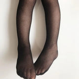 Damen Strumpfhose mit Fischgrätenmuster aus Elastischem Material – Schwarz 1