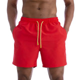 Isaac | Herren Schwimmshorts – Korallenrot