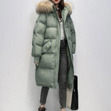 Lange Puffer Winterjacke mit Fell – Grün