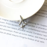 Verstellbarer Seestern-Ring in Silber und Gold – Silber