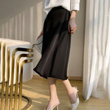 Brivelle – Eleganter Midirock aus Satin – Schwarz
