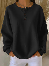 Damen nan Oversized Waffelstrick Henley-Pullover mit Knopfleiste und abgerundetem Saum Drune – Schwarz