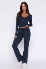Laureen | Ausgestellter Jumpsuit mit langen Ärmeln – Blau