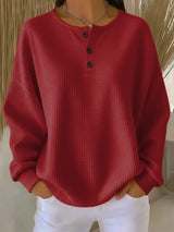 Damen nan Oversized Waffelstrick Henley-Pullover mit Knopfleiste und abgerundetem Saum Drune – Rot