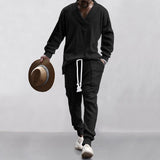 Herren nan gestricktes Lounge-Set mit V-Ausschnitt, Kabelstruktur und Kordelzug-Jogginghose Drune – Schwarz
