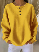 Damen nan Oversized Waffelstrick Henley-Pullover mit Knopfleiste und abgerundetem Saum Drune – Gelb