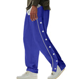 Herren nan weite Trackpants mit seitlicher Druckknopfleiste, elastischem Bund und reflektierendem Streamline-Streifen Drune – Königsblau