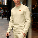 Herren nan strukturierter Baumwollstrickpullover mit Rautenstruktur, Rundhalsausschnitt und elastischen Bündchen Drune – Khaki