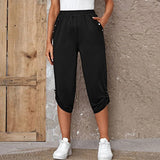 Damen nan lässige dreiviertellange Hose mit elastischem Bund, Eingrifftaschen und krempelbarem Saum Drune – Schwarz
