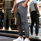 Herren nan tapered Jogginghose mit Kniepasse, elastischem Tunnelzugbund und Reißverschlusstaschen Drune – Dunkelgrau