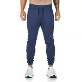 Herren nan schmal geschnittene Performance-Jogger mit Reißverschlusstaschen und knieabgestepptem Schnitt Drune – Navyblau