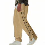 Herren nan weite Trackpants mit seitlicher Druckknopfleiste, elastischem Bund und reflektierendem Streamline-Streifen Drune – Khaki