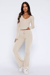 Laureen | Ausgestellter Jumpsuit mit langen Ärmeln – Beige
