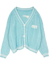 Damen nan kurz geschnittene Strickjacke mit V-Ausschnitt, Kontrastpaspel und oversized Ärmeln Drune – 21445 Blau