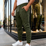 Herren nan tapered Jogginghose mit Kniepasse, elastischem Tunnelzugbund und Reißverschlusstaschen Drune – Olivgrün