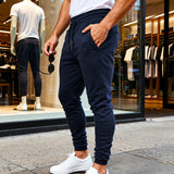 Herren nan tapered Jogginghose mit Kniepasse, elastischem Tunnelzugbund und Reißverschlusstaschen Drune – Navyblau