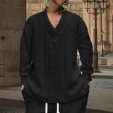 Herren nan grob gestrickter V-Ausschnitt-Pullover mit Zopfmuster und relaxed Fit Drune – Schwarz