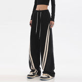 Damen nan weite Jogginghose mit Denim-Einsätzen, elastischem Bund und seitlichen Kontraststreifen Drune – 20988 Schwarz