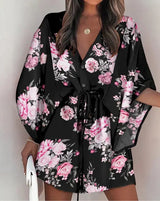 Nylaith – Stilvolles Kleid mit V-Ausschnitt und Fledermausärmeln – Schwarz