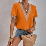 Elyria – Elegante Spitzenbluse mit V-Ausschnitt – Orange