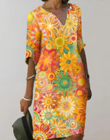 Fauna – Kleid mit leuchtenden Blumen – Gelb