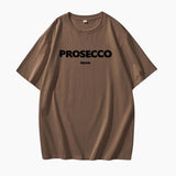 Poppy | Modisches Prosecco Print Oversized T Shirt – Braun