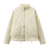 Kuschelige Winterjacke mit Taschendetails – Elfenbeingelb