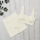 Nahtloses, Hochgeschnittenes Yoga und Fitness Outfit – U gelblich-weiß