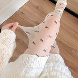 Stylische Damen-Strumpfhose im Herz- und Punkt-Stil – Milchweißer Bogen