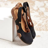 Ravena – Flache Ledersandalen mit Rückenrieme – Schwarz