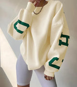 Übergroßer, trendiger pullover mit buchstaben am armel für damen – Gelb