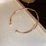 Elara – Elegantes Armband Mit Twist – Bronze