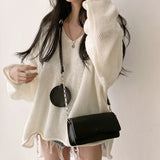 Lockerer Pullover mit V-Ausschnitt – Beige