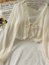 Luciana - Transluzente Bluse mit Schleife – Albaricoque