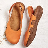 Ravena – Flache Ledersandalen mit Rückenrieme – Orange