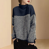 Pullover mit hohem Kragen und Fischgrätenmuster – Marinblau
