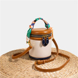 Bucket Bag Damen Kunstleder – Zylinderform mit Schalgriff – Marineblau / Braun